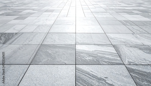 A gray marble floor with rectangular tiles and thin black grout lines