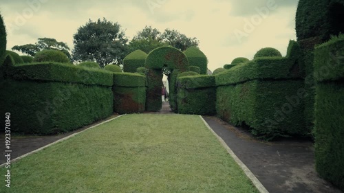 Walking through the hedge labyrinths of Tulcán Cemetery topiary garden in Ecuador