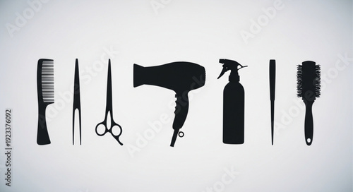 Collection of black silhouette hairdressing tools on a light background.