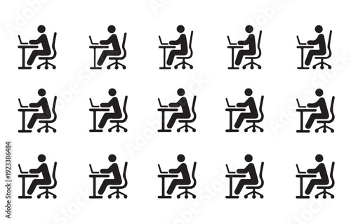 Ergonomic office workstation layout with employees using laptop computers at desks in rows