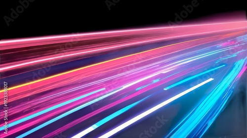 Modern abstract background featuring high-speed motion on a road with neon glowing lines and dynamic light trails. 