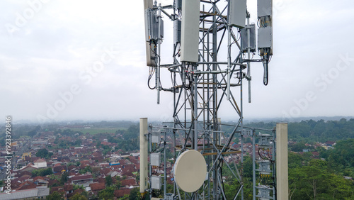 Cellular Radio Masts and Transmitters Antennas on Communication Tower. Aerial View Telecommunications Infrastructure