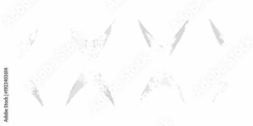 Abstract gray brushstrokes forming a fractured geometric pattern against white