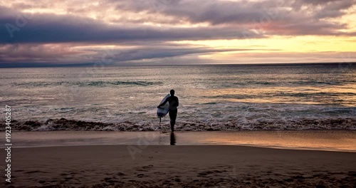 Running, back and man on beach with surfboard for water sports, adventure and hobby on holiday. Surfer, nature and person ready for surfing activity in ocean on vacation, break and weekend at sunrise