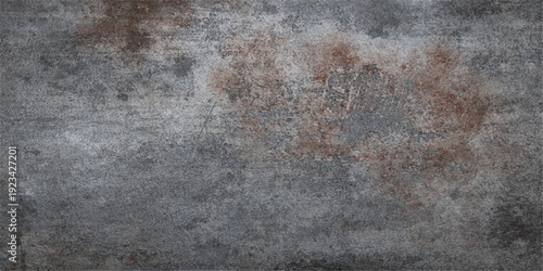 A dark and aged vintage stone wall background features a rough grunge texture with a gray concrete surface pattern that provides a dirty and weathered material design for an antique backdrop