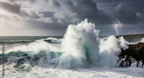 A powerful ocean wave crashes against a rocky shoreline under a stormy sky with lightning