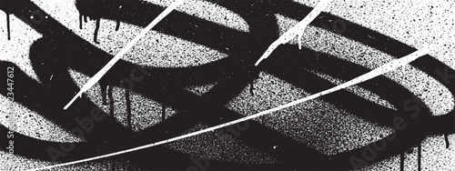 Black and white abstract graffiti art on a textured wall urban street style.