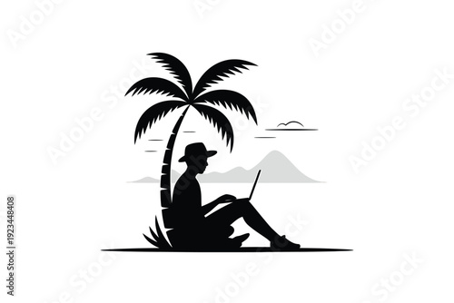 Silhouette of a person working on a laptop under a palm tree