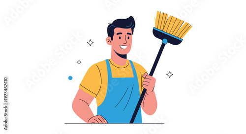 Cheerful professional cleaner man wearing a yellow shirt and blue apron holds a large broom while smiling during his daily janitorial service work.
