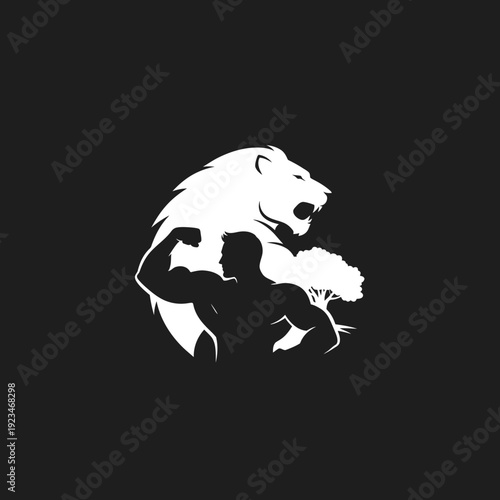 Muscular man flexing with bear.