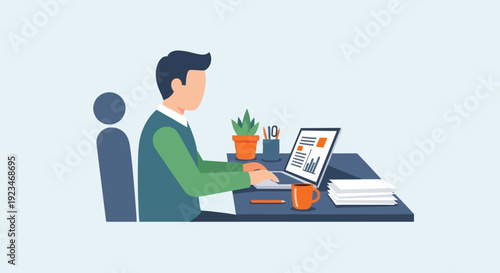 Man sitting at desk with laptop.