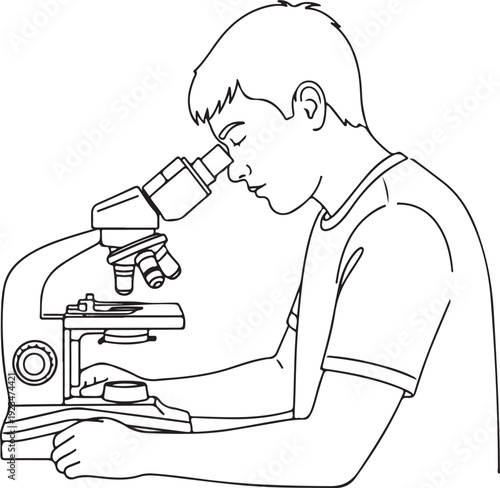 Boy looking through microscope child science