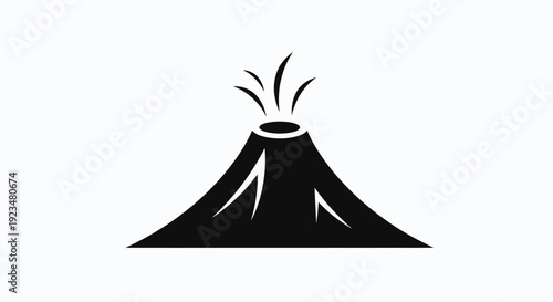 Black silhouette of erupting volcano.