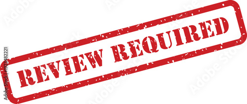 Red rubber stamp reading review required angled across a clean white background