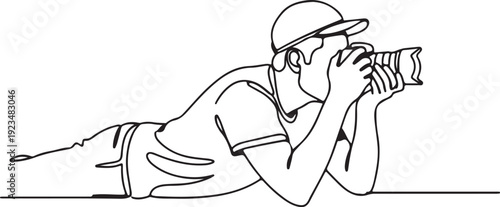 Man lying down taking with camera person black and white