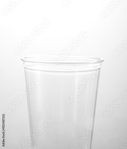 Wallpaper Mural Transparent plastic cup with white background Torontodigital.ca