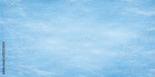 A bright blue grunge texture background evokes a cold winter sky with abstract white clouds and frozen ice patterns for a weathered nature wallpaper