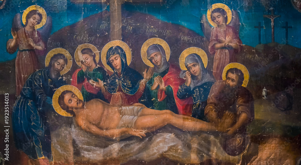 Naklejka premium An old icon depicts the Entombment of Christ, at the Sihastria Monastery - Romania. It is a biblical scene painted on canvas