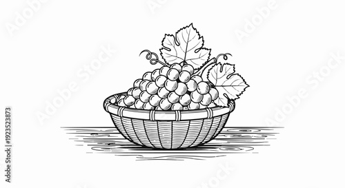 A basket of grapes with leaves and tendrils rests on a wooden surface