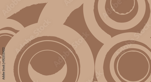 Brown abstract circular pattern design element.