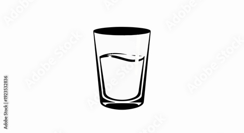 A clear glass filled with water, reflecting light