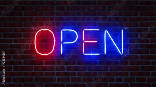 Neon open sign glowing on a brick wall at night