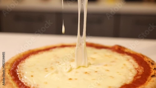Sliced pizza with melted cheese