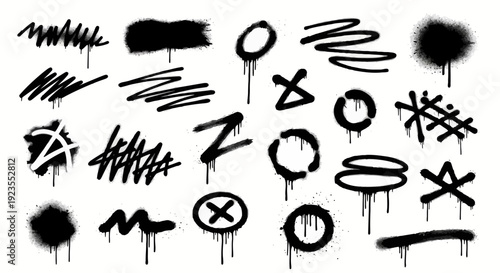 A collection of black spray paint graffiti elements and abstract shapes with dripping paint effects on a white background.