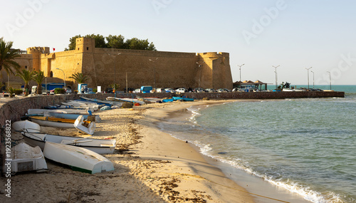 Mediterranean sea and outer stone wall of fort surrounding old medina of Hammamet, Tunisia. Africa