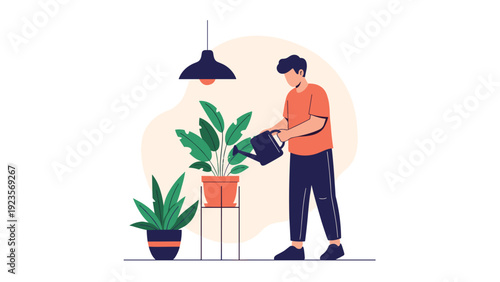 Young man carefully watering large indoor potted houseplants with a dark blue watering can in a clean minimalist living space.