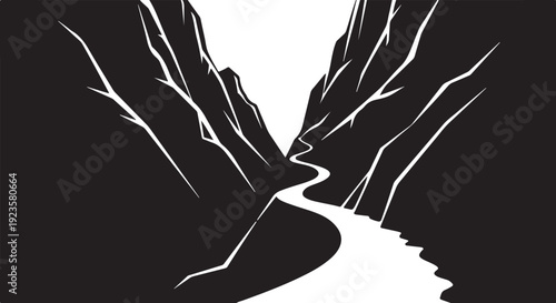 Winding road through dark mountains with white light ahead