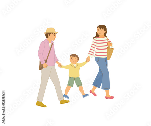 手をつないで歩く3人家族