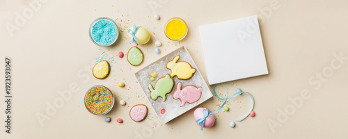 Wallpaper Mural Colorful easter cookies in basket with Multi colors Easter eggs on colored background . Pastel color Easter eggs. holiday concept with copy space Torontodigital.ca