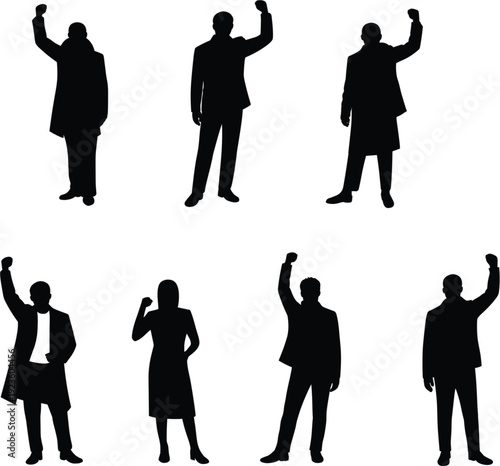 Diverse group of people silhouettes standing together with raised fists for protest revolution unity and strength concept
