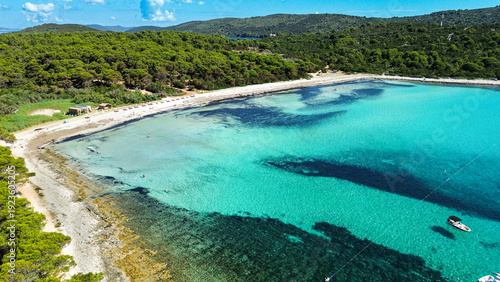 Fényképezés Saharun Beach on Dugi Otok dazzles with powdery white sand crystalline turquoise shallows fragrant pines and serenely sun-kissed warm bright horizons