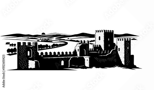 Ancient fortress ruins stand against a silhouetted landscape at sunset