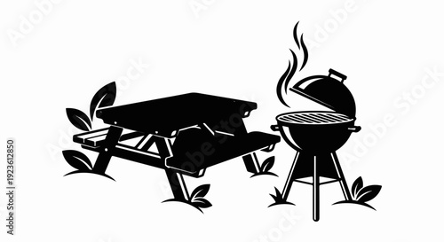 Barbecue grill and picnic table with plants in grass