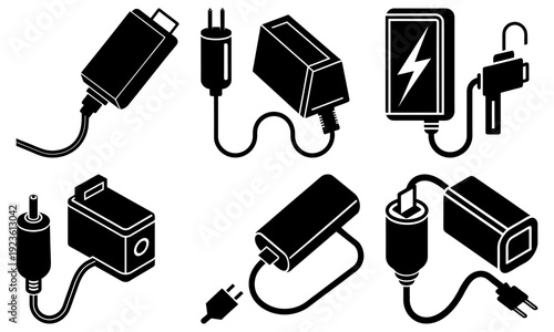 Collection of various electronic power adapters and chargers with different connectors and cables