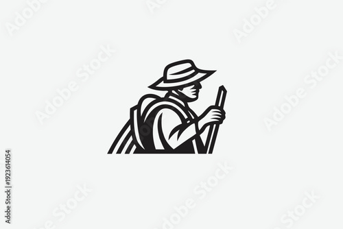 Monochrome illustration shows an adventurer with backpack and hat holding a walking stick in hand