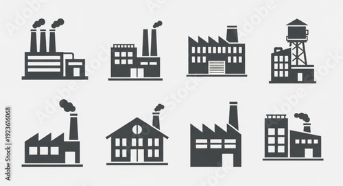 Various industrial factory buildings with chimneys and smoke emitting from them.