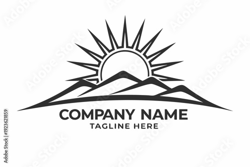 Rising sun bursts above sharp mountain peaks in monochrome outline