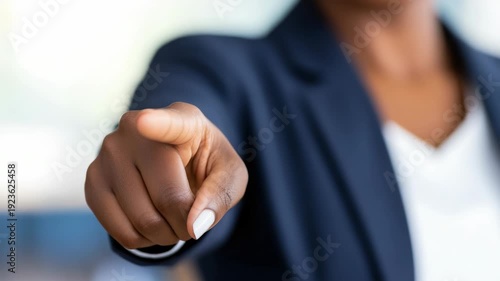 Businesswoman pointing finger