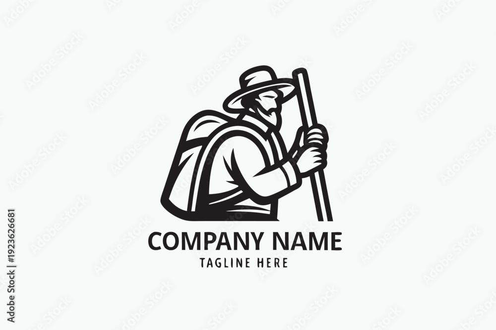 Obraz premium Silhouette shows a hiker with a backpack and walking stick, standing before two mountains