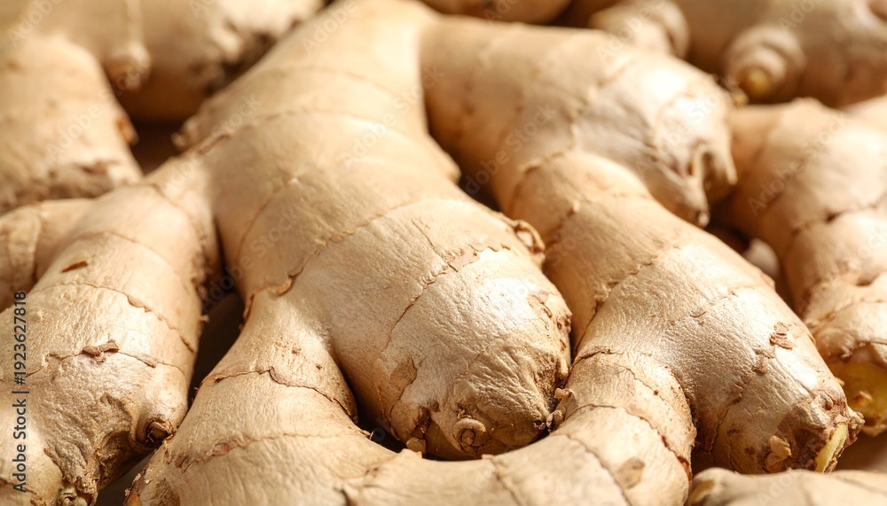 Fototapeta premium Fresh raw ginger on whole background, close up