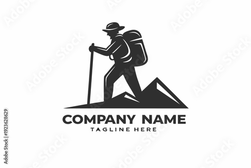 Silhouette traveler climbs mountain peak with stick and backpack on white backdrop