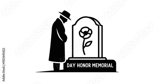 A man paying respects at a memorial with a rose on day of honor