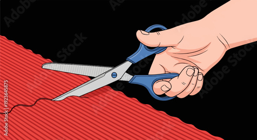 Hand holding scissors cutting red striped material