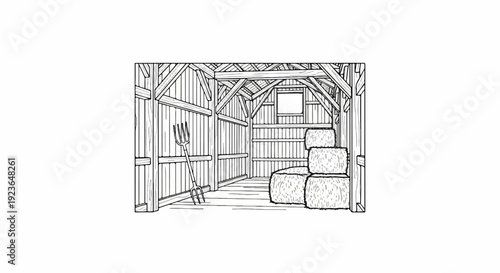 Interior of a wooden barn with stacked hay bales and a pitchfork