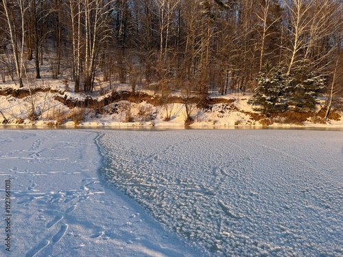 Deep Lake frozen on a sunny day, Kaunas, Lithuania