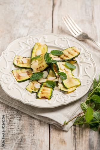 grilled zucchinis with sliced almonds and mint